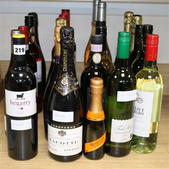 Twenty-three assorted bottles of wine including reds, whites and Champagne